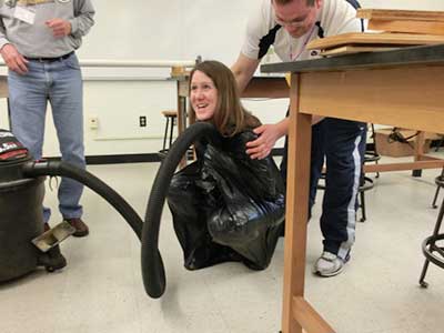 Jennifer Docktor gets &quot;vacuum sealed&quot; at University of Wisconsin - La Crosse photo