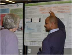 Sean Gallardo from CSU presents his research during a poster session on Tuesday night.