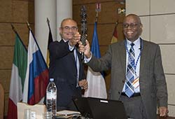 Francesco Sette with Sekazi Mtingwa holding African calling stick